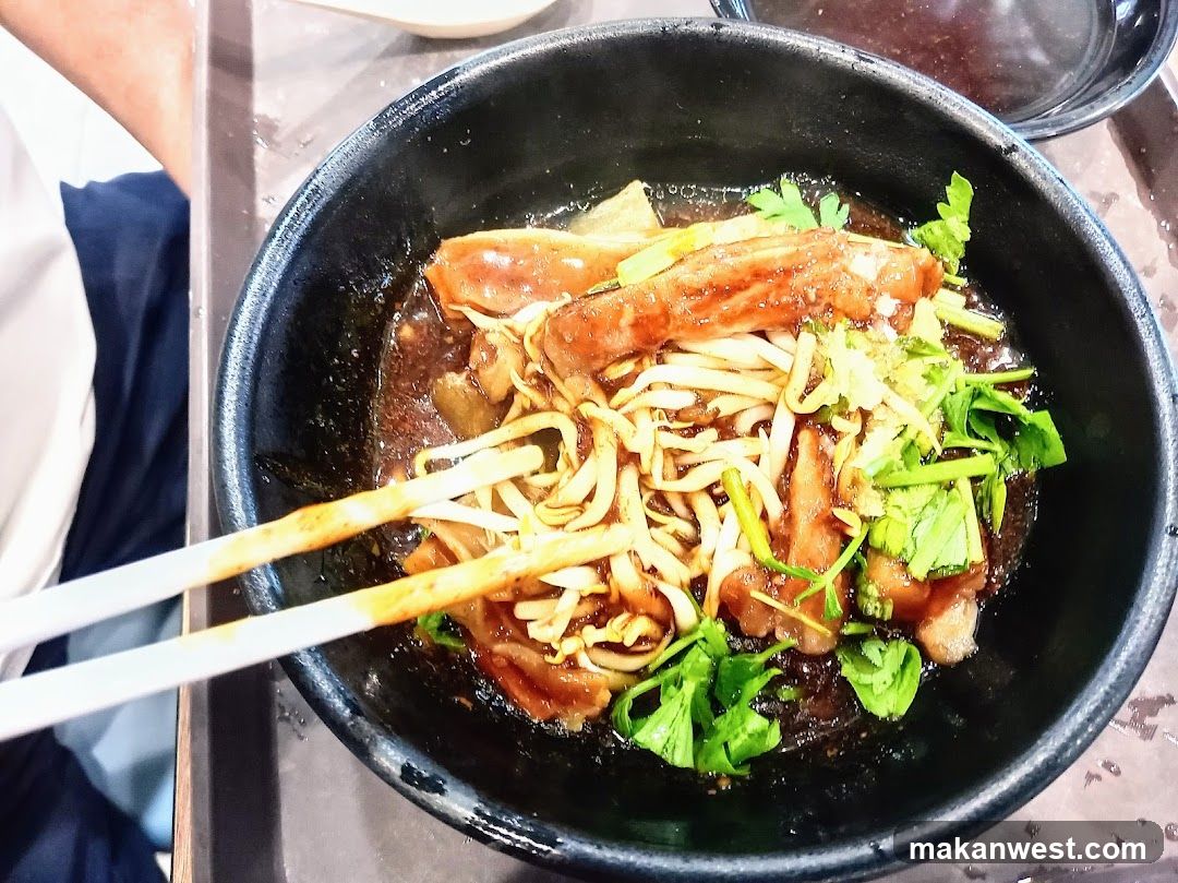 Bowl of Noodles with Meat and Cilantro