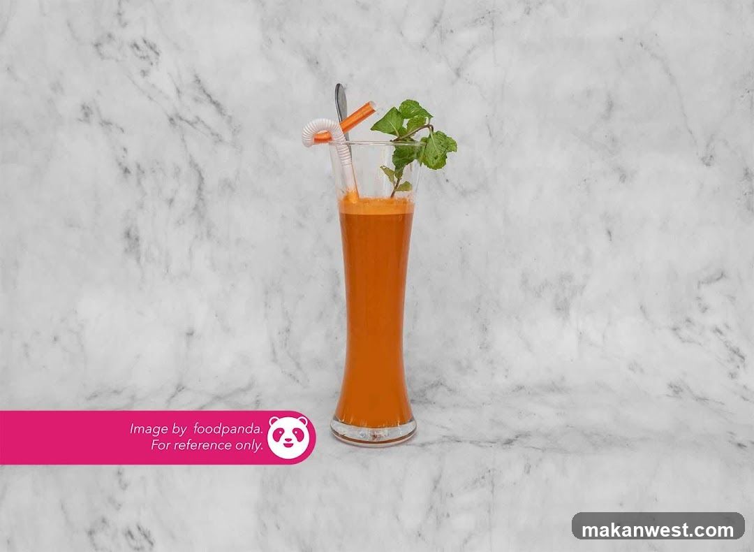 Orange Juice with Mint Garnish