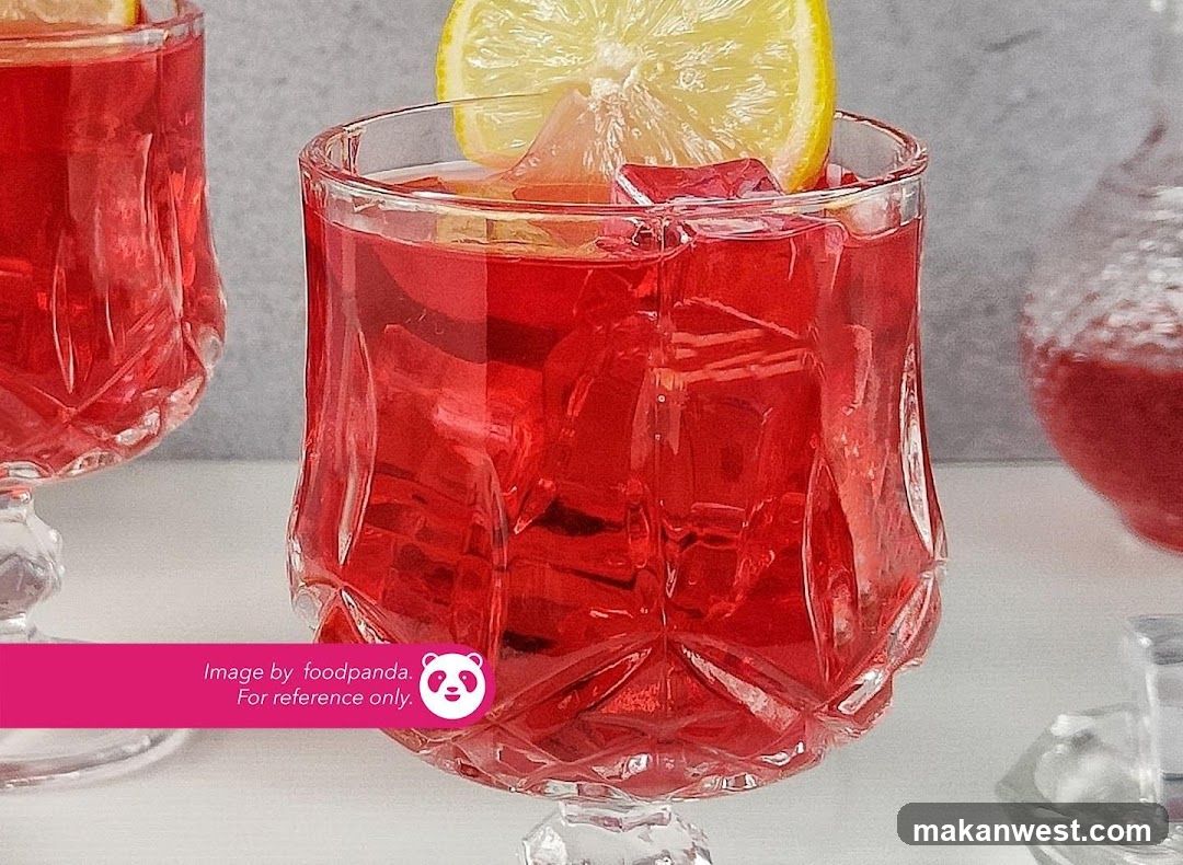 Red Lemonade with Ice and Lemon Slice