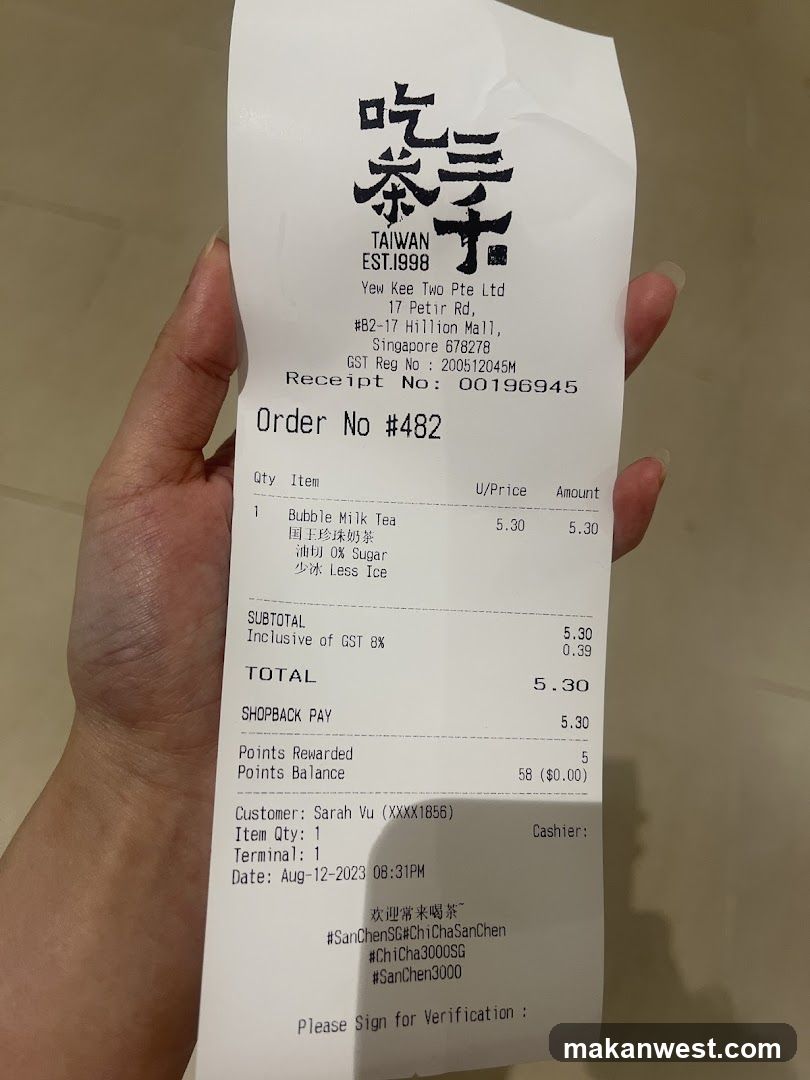 Receipt held in hand