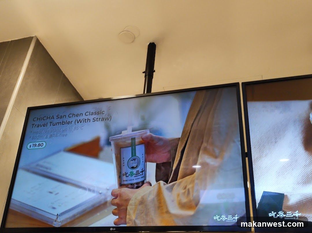 TV Screen Displaying Drink Advertisement
