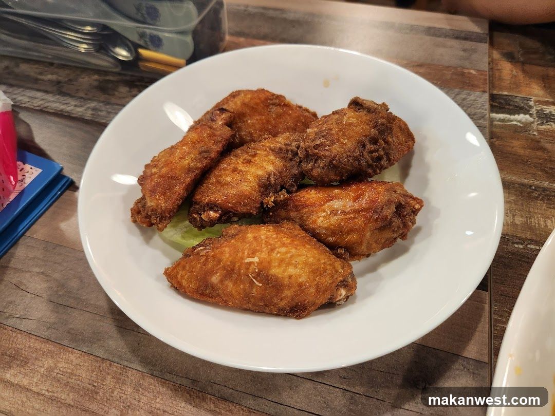 Fried Chicken Wings on a White Plate