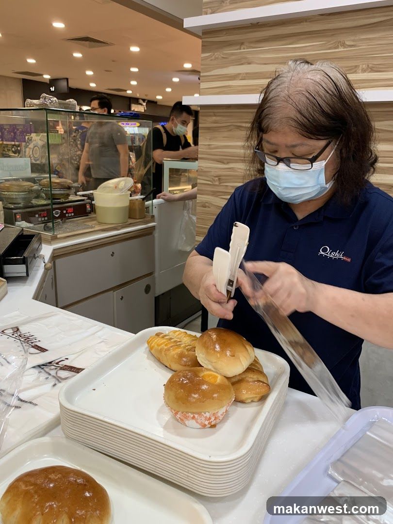 Bakery Interior with Staff Preparing Food