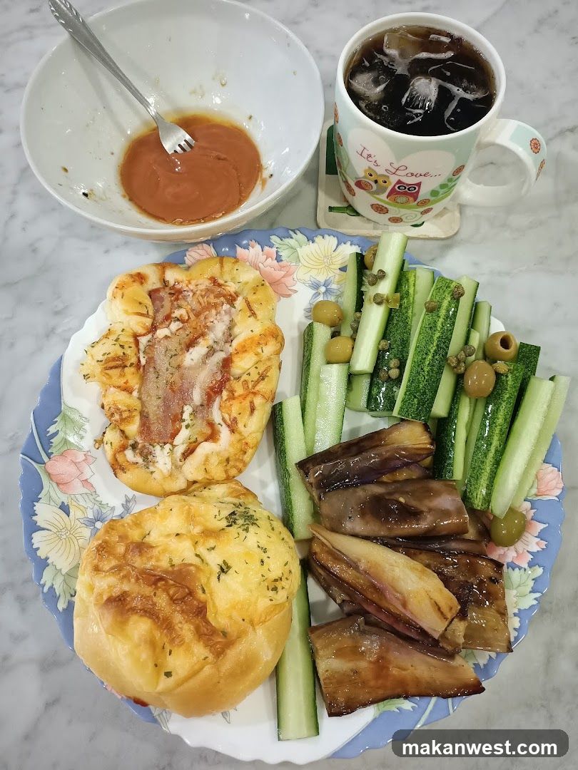 Breakfast Meal with Bread, Cucumber, Eggplant and Coffee