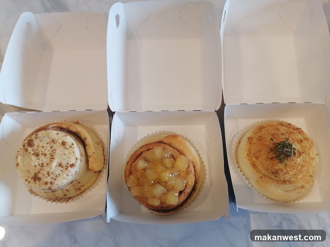 Three Pastries in Boxes
