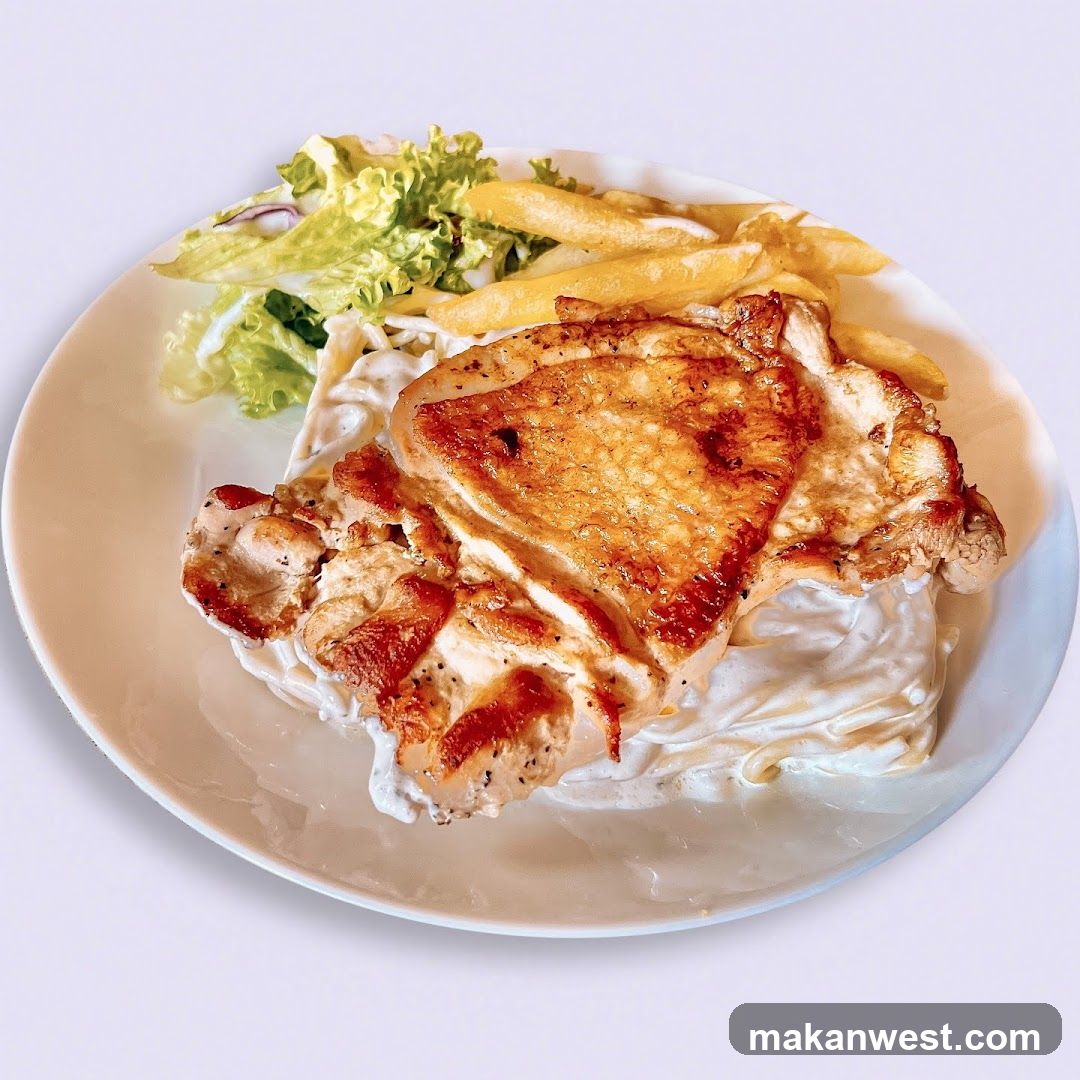 Chicken with Creamy Sauce and Fries