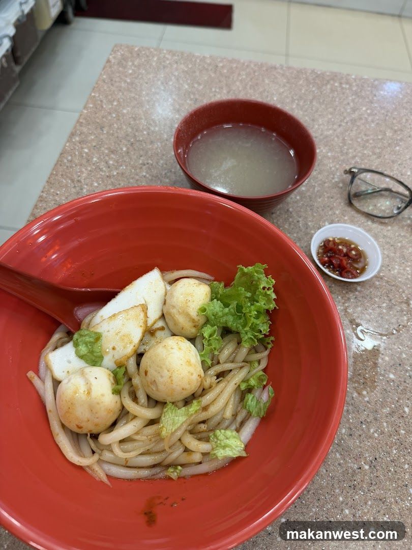 Noodle Bowl with Fish Balls and Lettuce