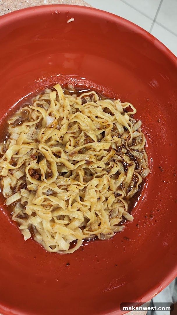 Bowl of Noodles in Red Dish
