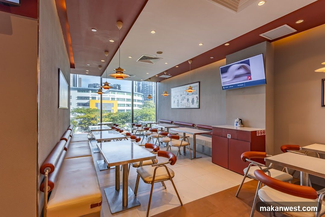Restaurant Interior with Large Windows and Seating Area