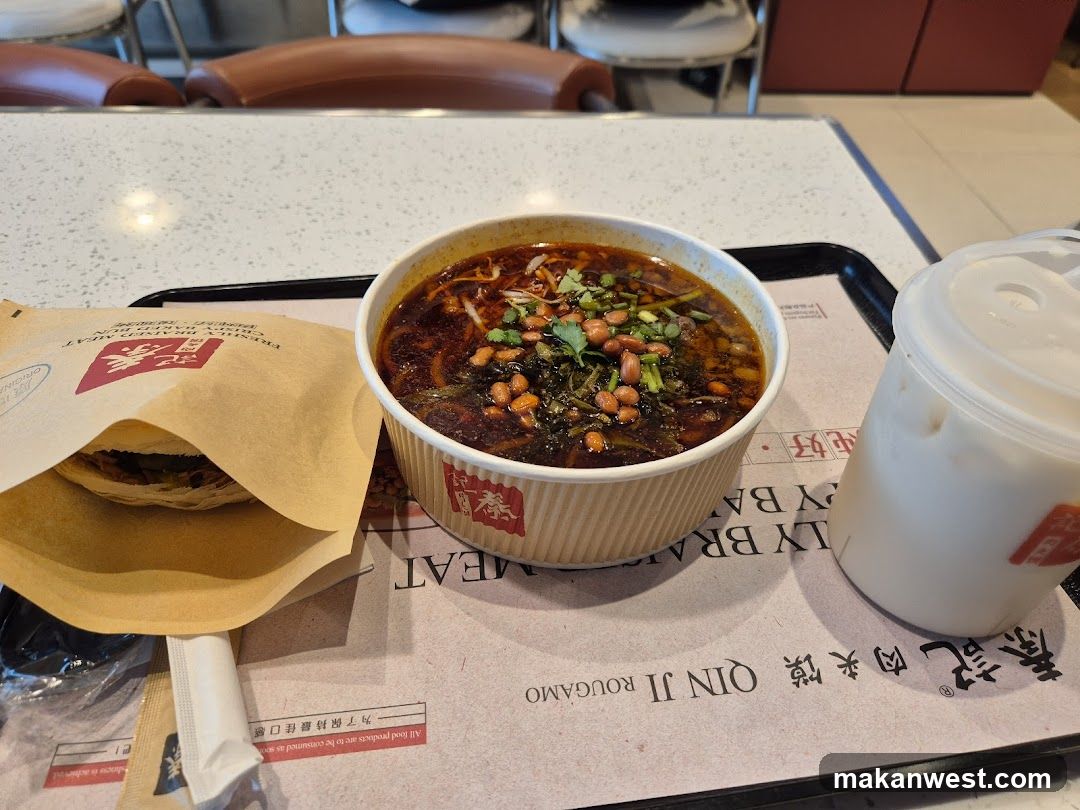 Food Tray with Spicy Noodles and Sandwich