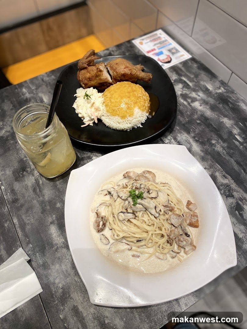 Dinner Table Setting with Chicken and Pasta