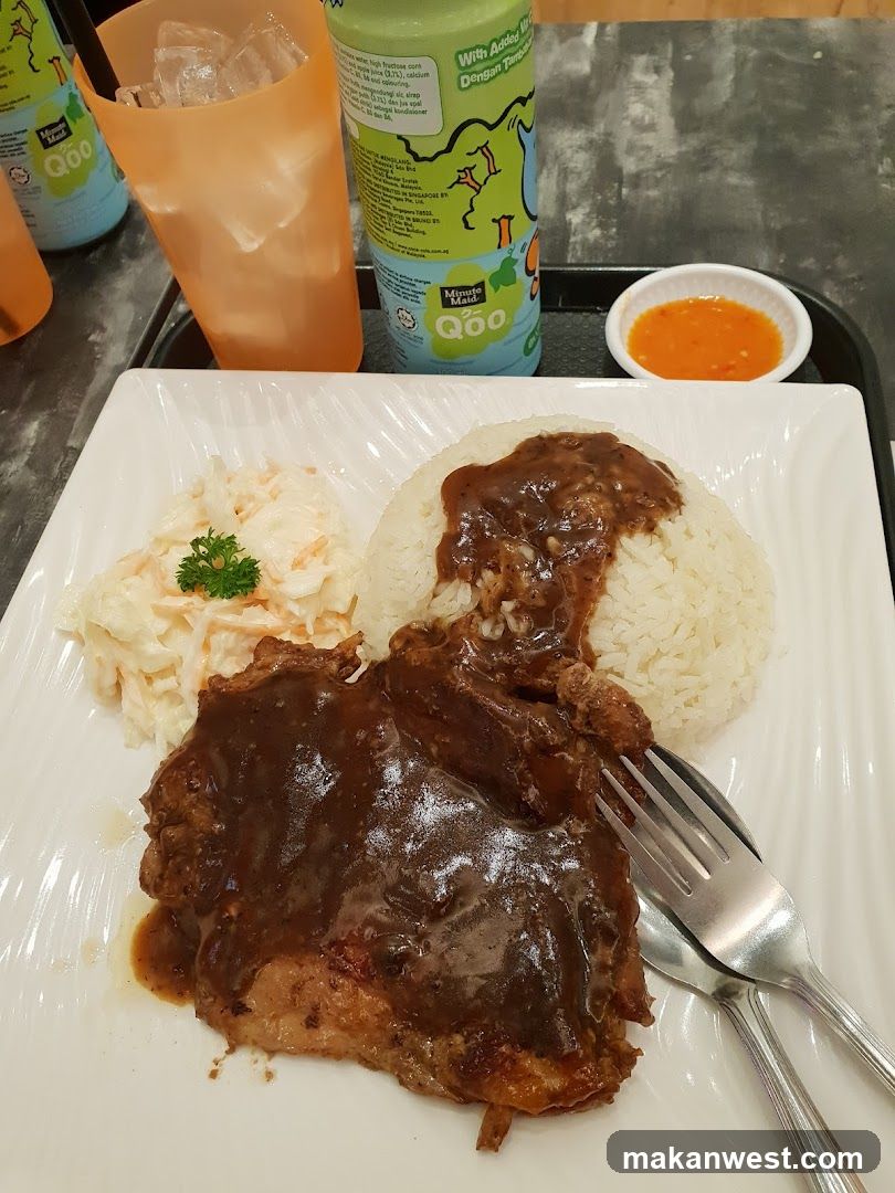 Pork Chop with Rice and Coleslaw
