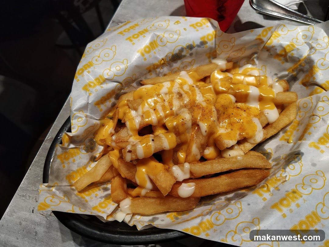 Loaded Fries with Cheese Sauce