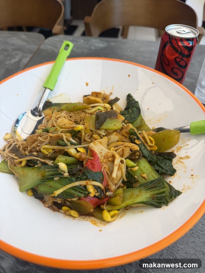 Bowl of Stir-fried Noodles with Vegetables and Soy Sauce