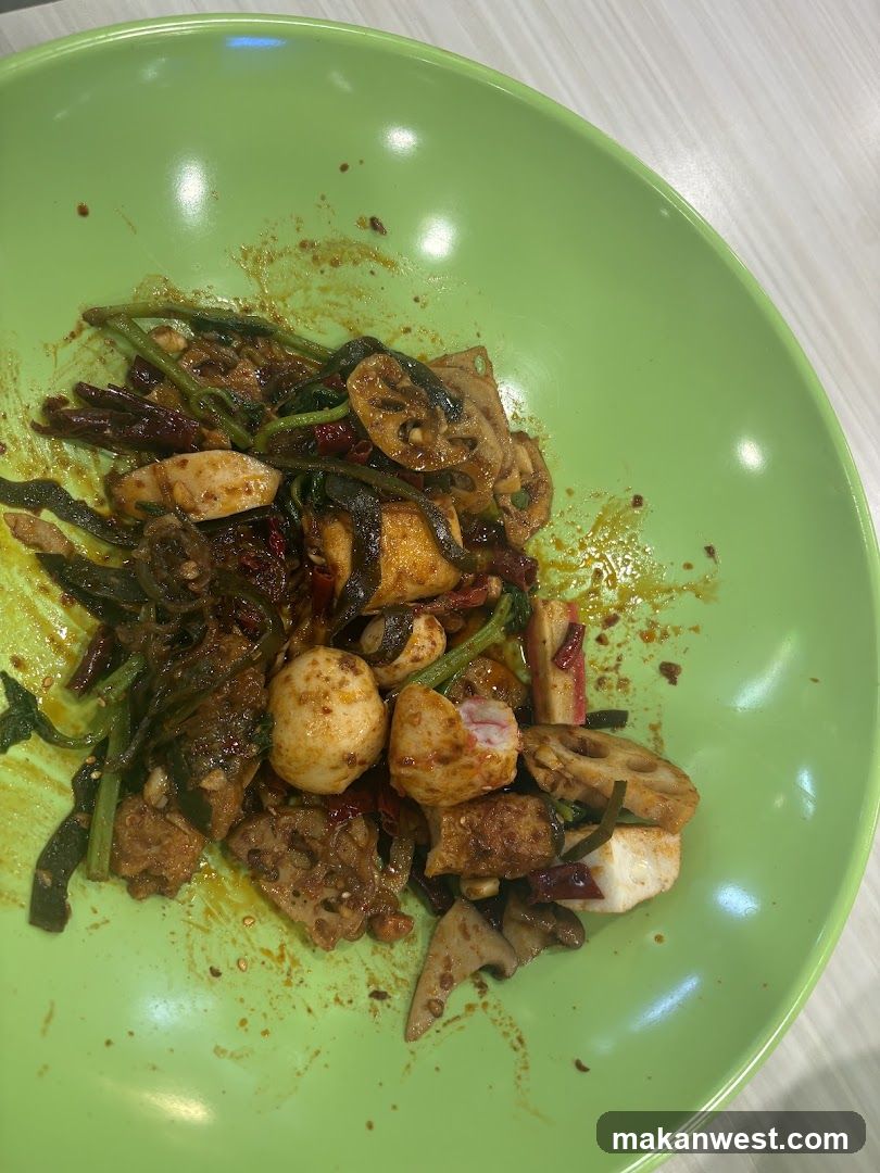 Stir-fried vegetable dish in green bowl