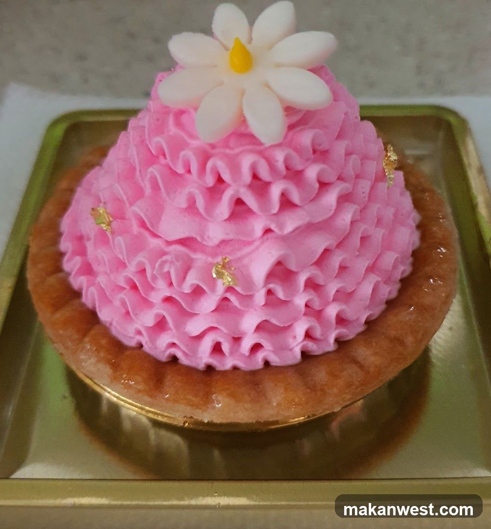 Pink Ruffled Tart with Flower Decoration