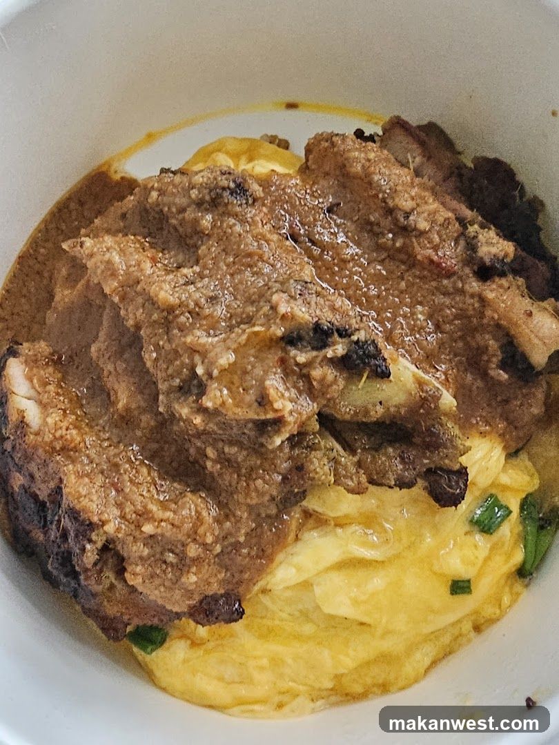 Bowl of Meat with Sauce and Egg