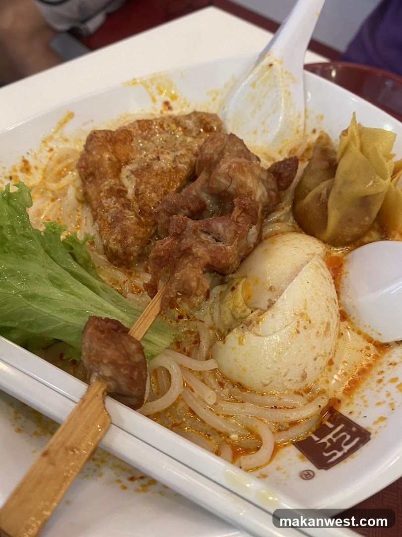 Spicy Noodle Bowl with Meat and Dumplings
