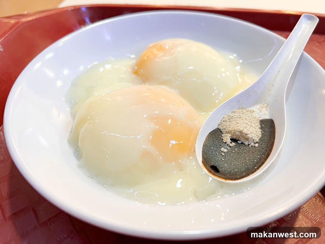 Soft-boiled eggs with soy sauce and pepper