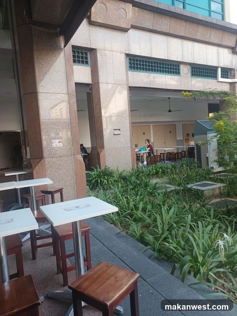 Outdoor seating area near building entrance
