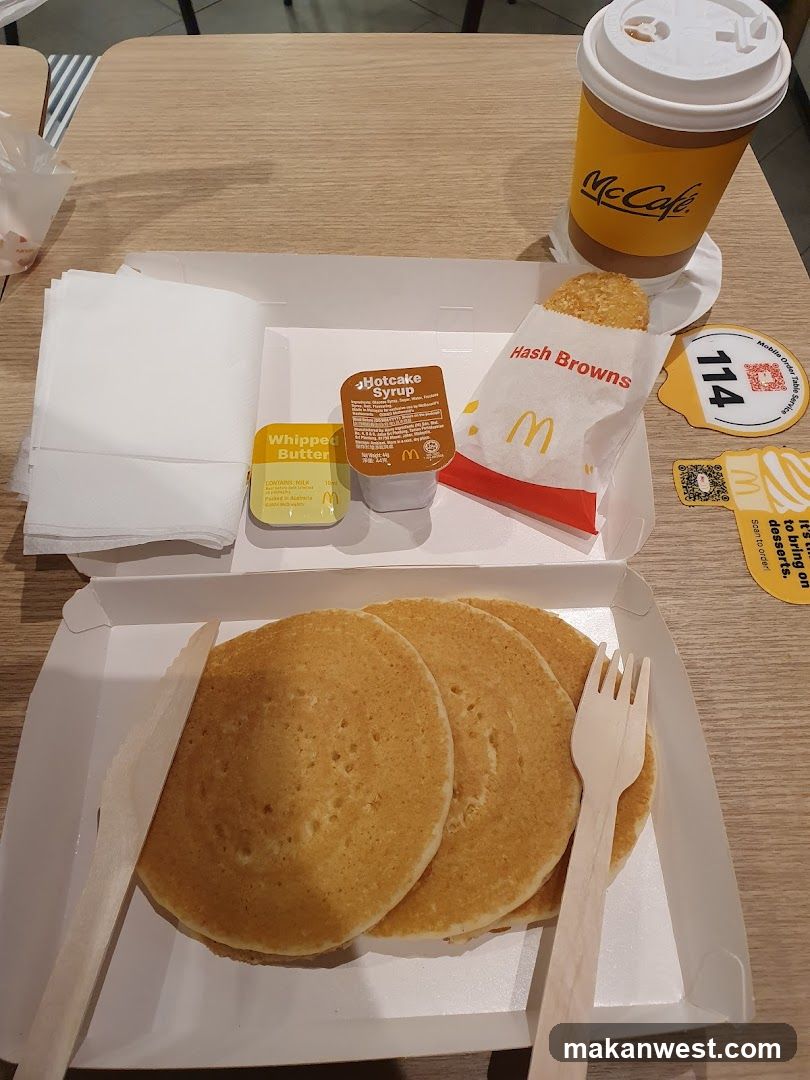 McDonald's Meal with Pancakes and Coffee