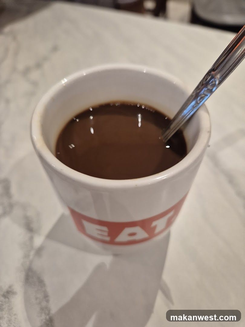 Coffee in a cup with spoon