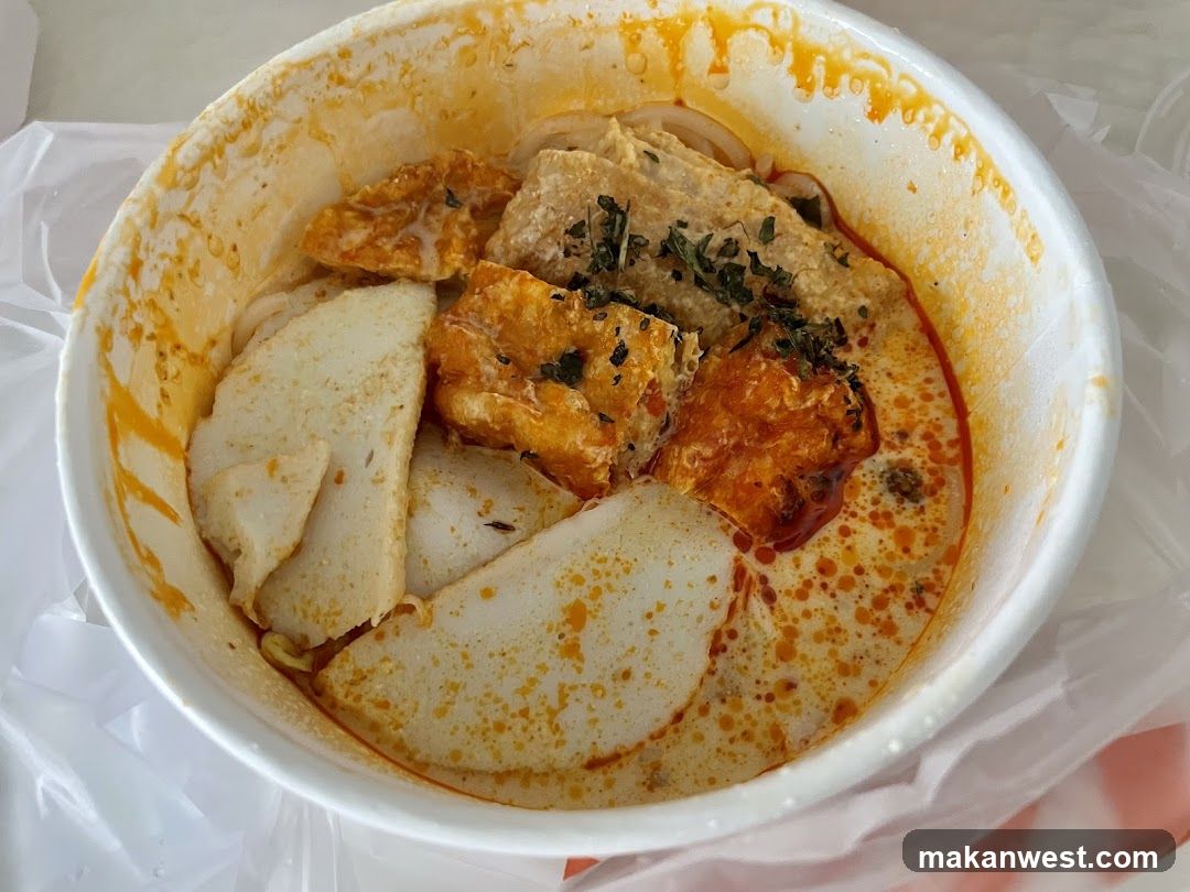 Spicy Noodle Bowl with Tofu and Fish Cake