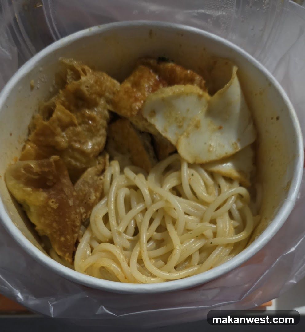 Bowl of noodles with toppings