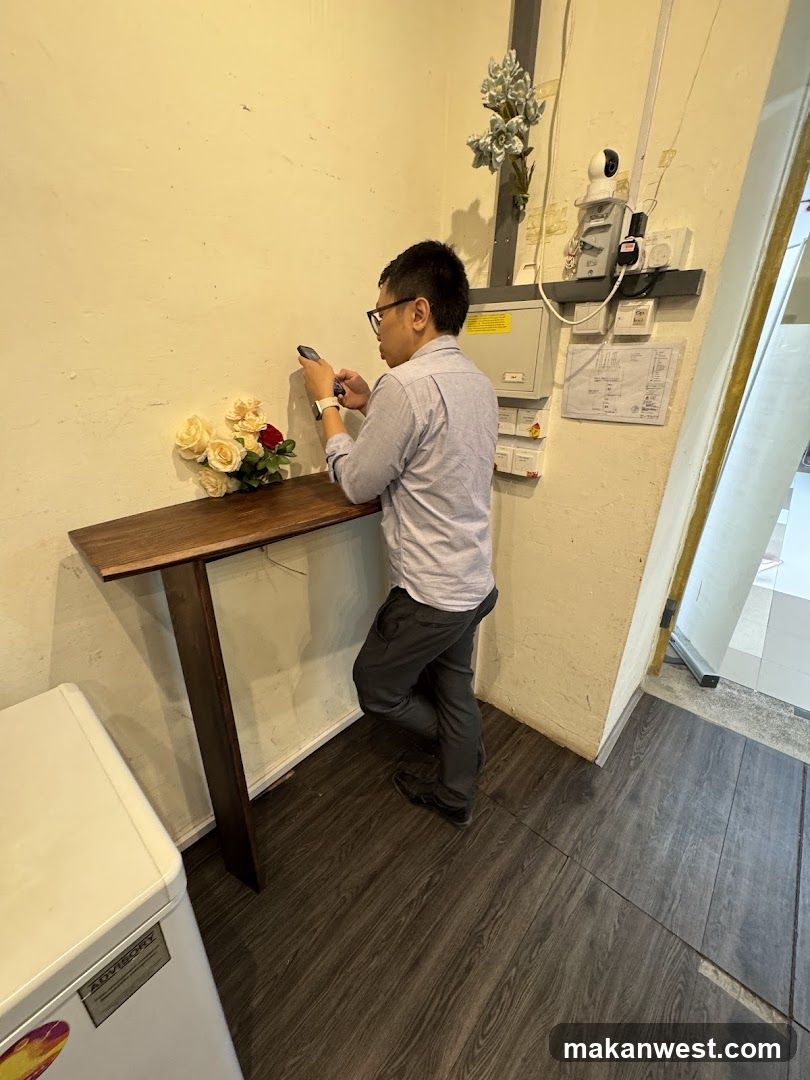 Man Taking Photo of Interior Space
