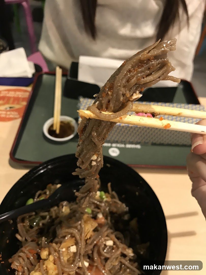 Noodle Dish with Chopsticks