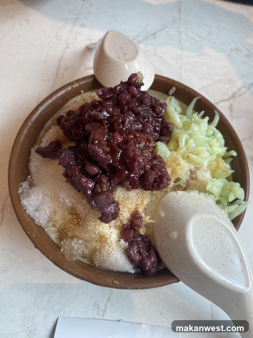 Bowl of shaved ice dessert with red bean and cabbage slaw