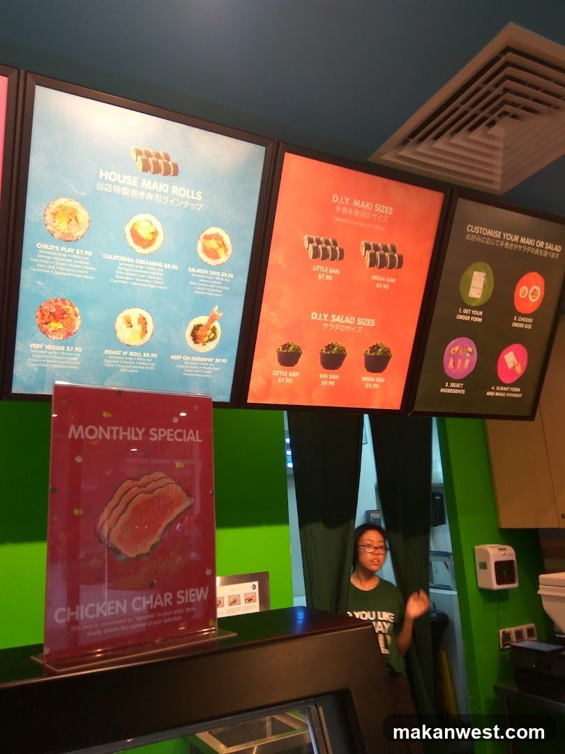 Restaurant Interior with Menu Boards and Staff