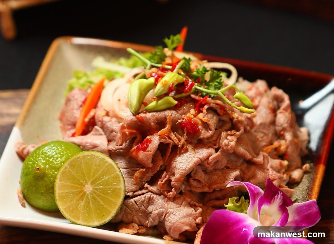 Spicy Beef Salad with Lime and Orchid Garnish