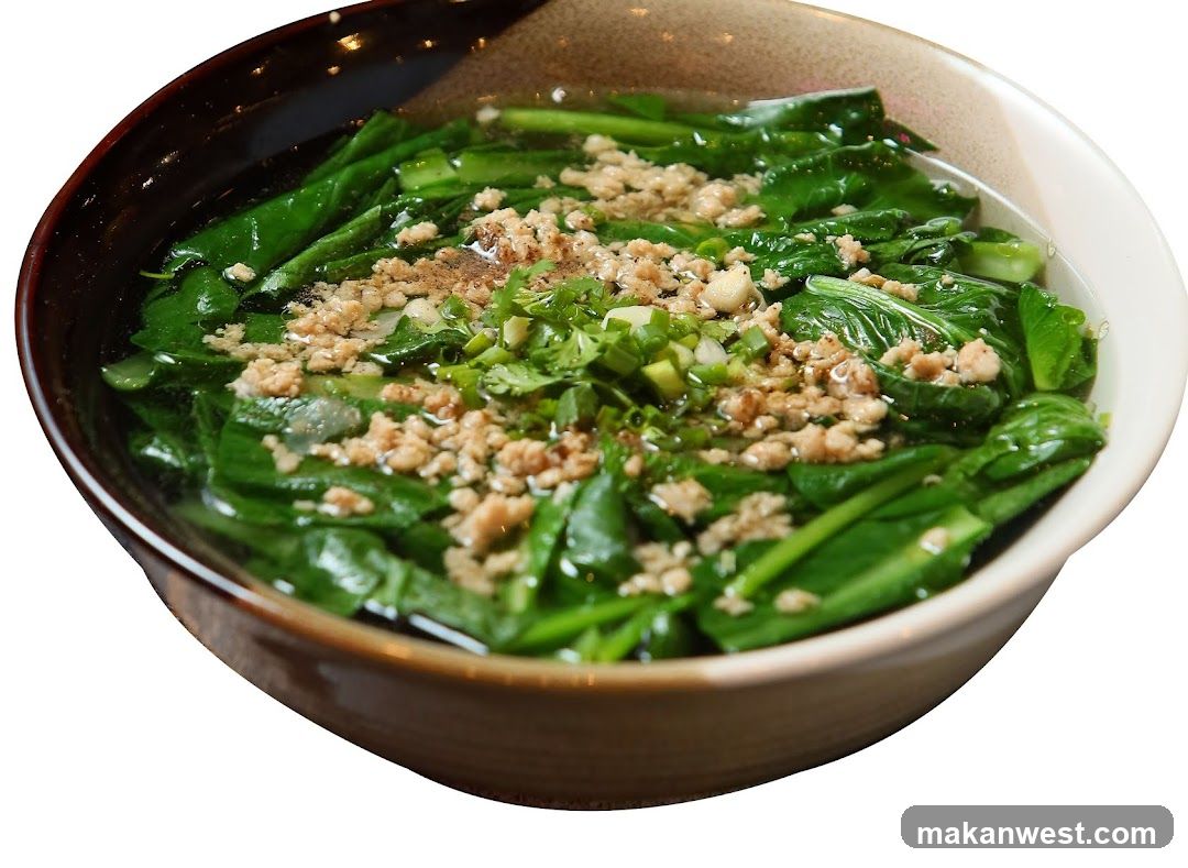 Bowl of Leafy Greens with Garlic Sauce