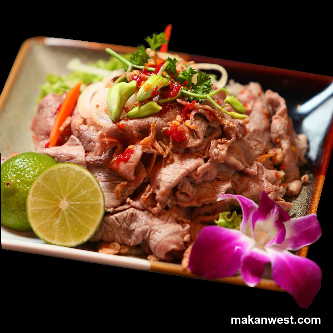 Spicy Beef Salad with Lime and Flower Garnish