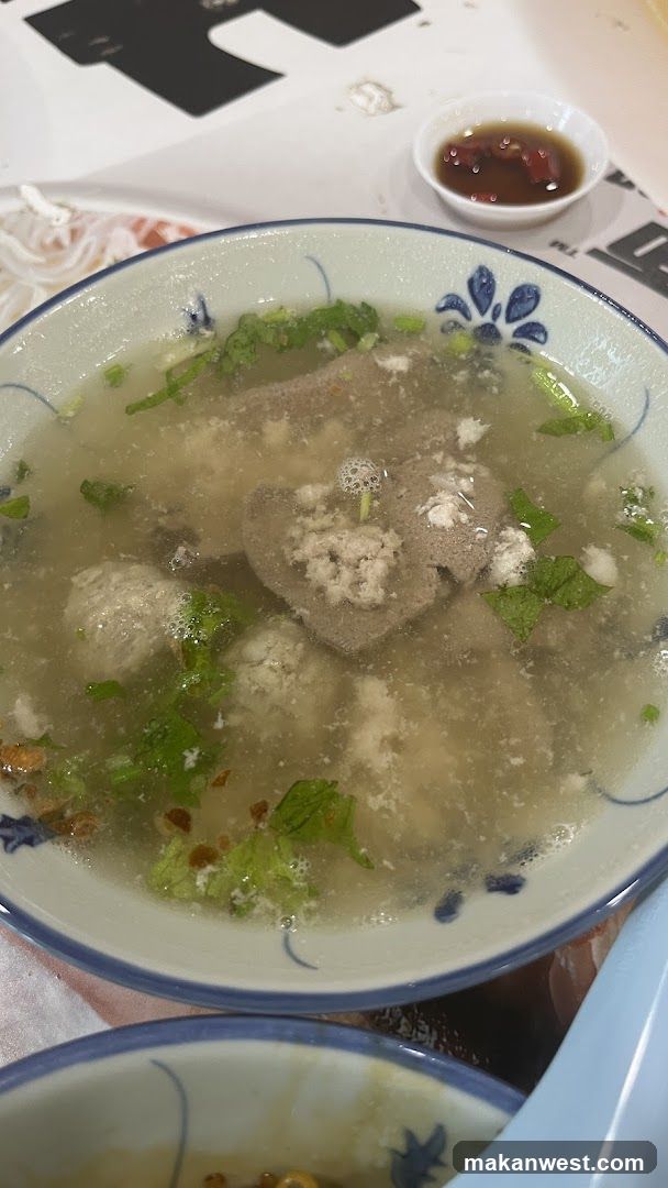Bowl of Soup with Meatballs and Liver