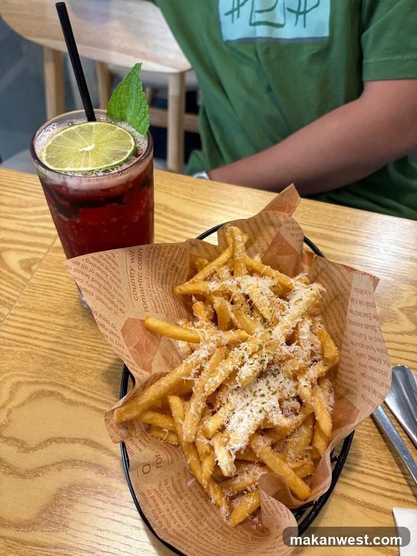 Fries and Drink on Table