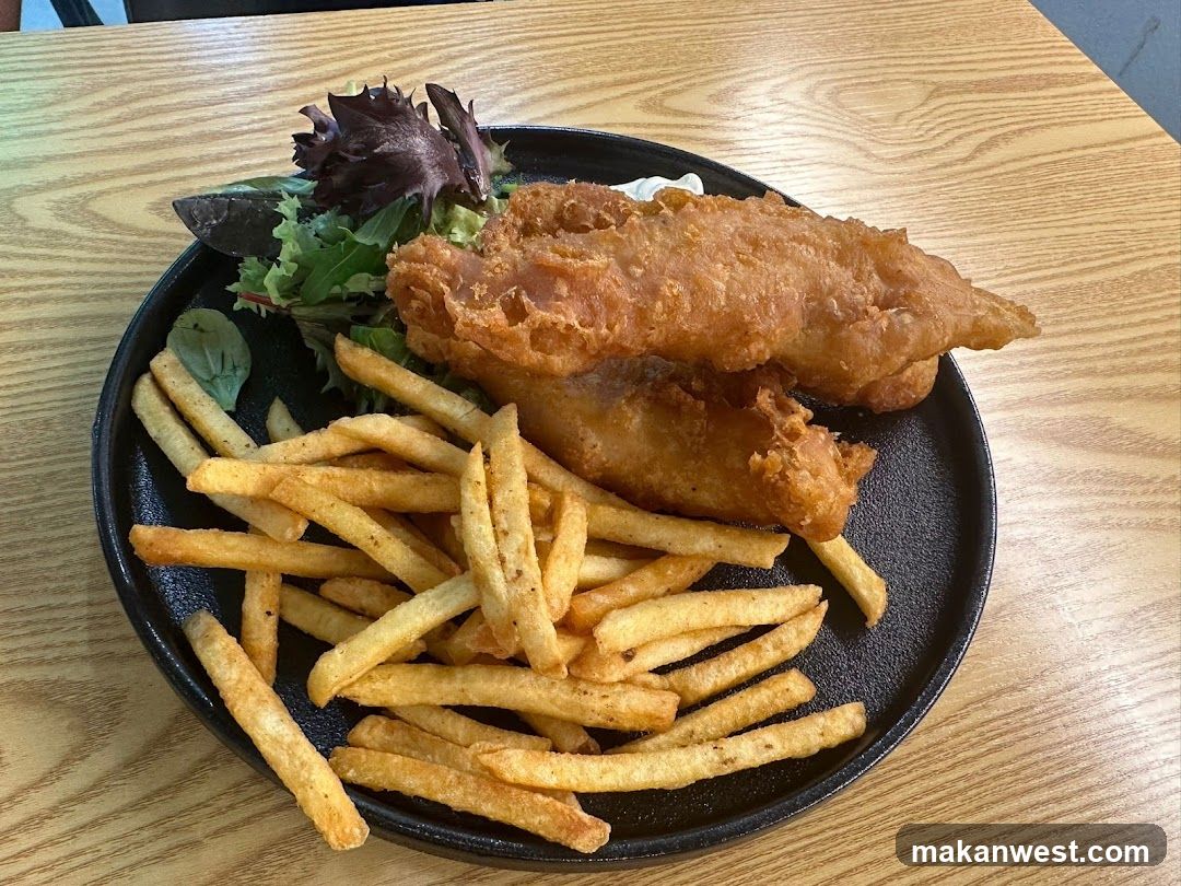 Fish and Chips on a Black Plate