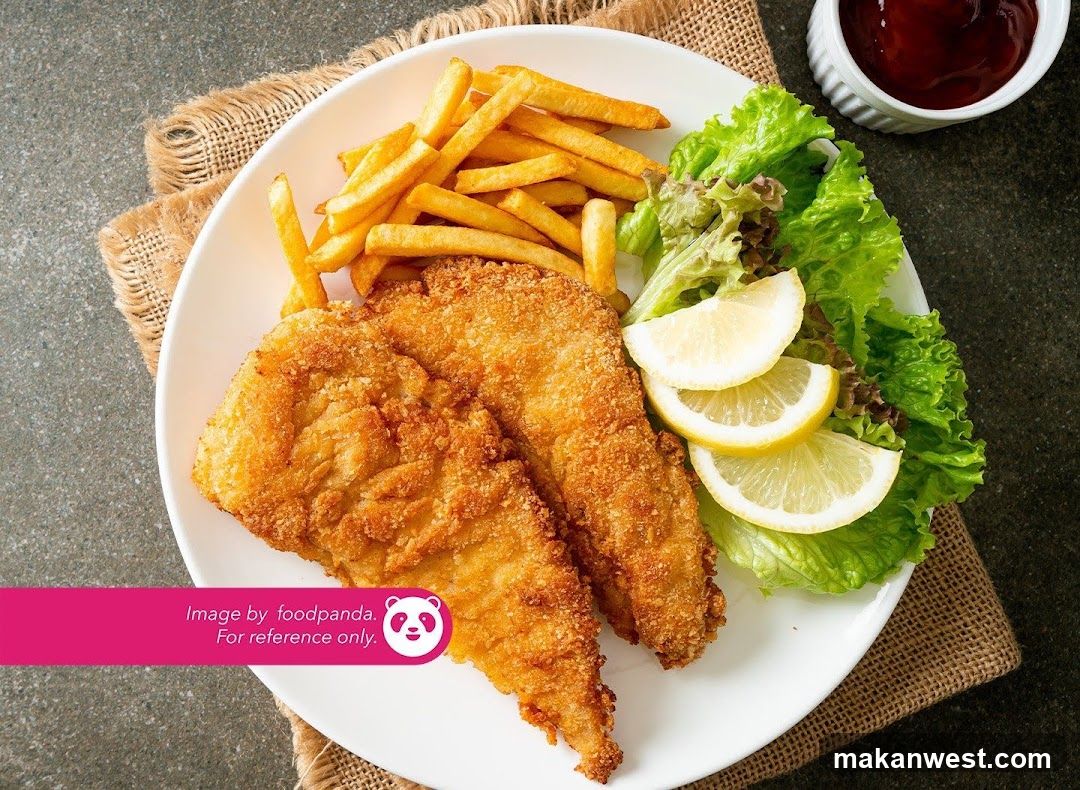 Fried Fish and Chips with Lemon Wedges