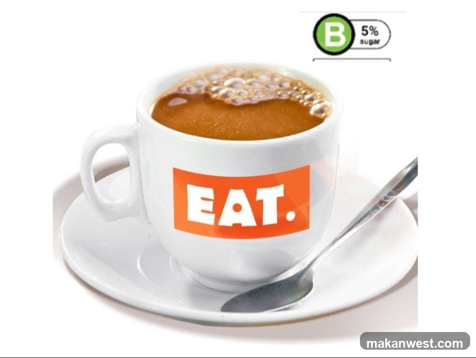 Coffee cup with "EAT." logo