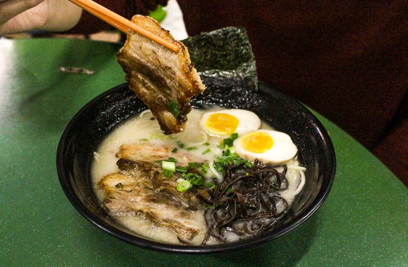 A bowl of tonkotsu ramen with chashu, egg and nori at Buta Kin in Beauty World Food Centre, one of the most affordable ramen bowls in Singapore starting at SGD 5.50