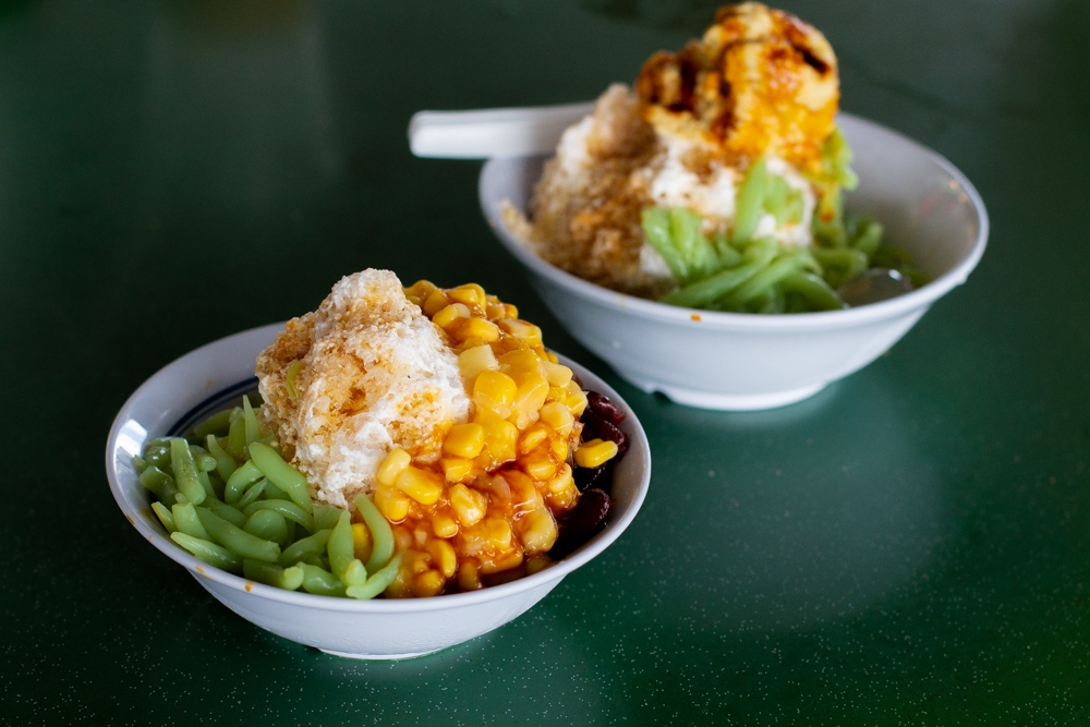 Assorted chendol desserts at Ye Tang Chendol in Beauty World Food Centre, including the signature durian chendol with D24 durian and attap seeds