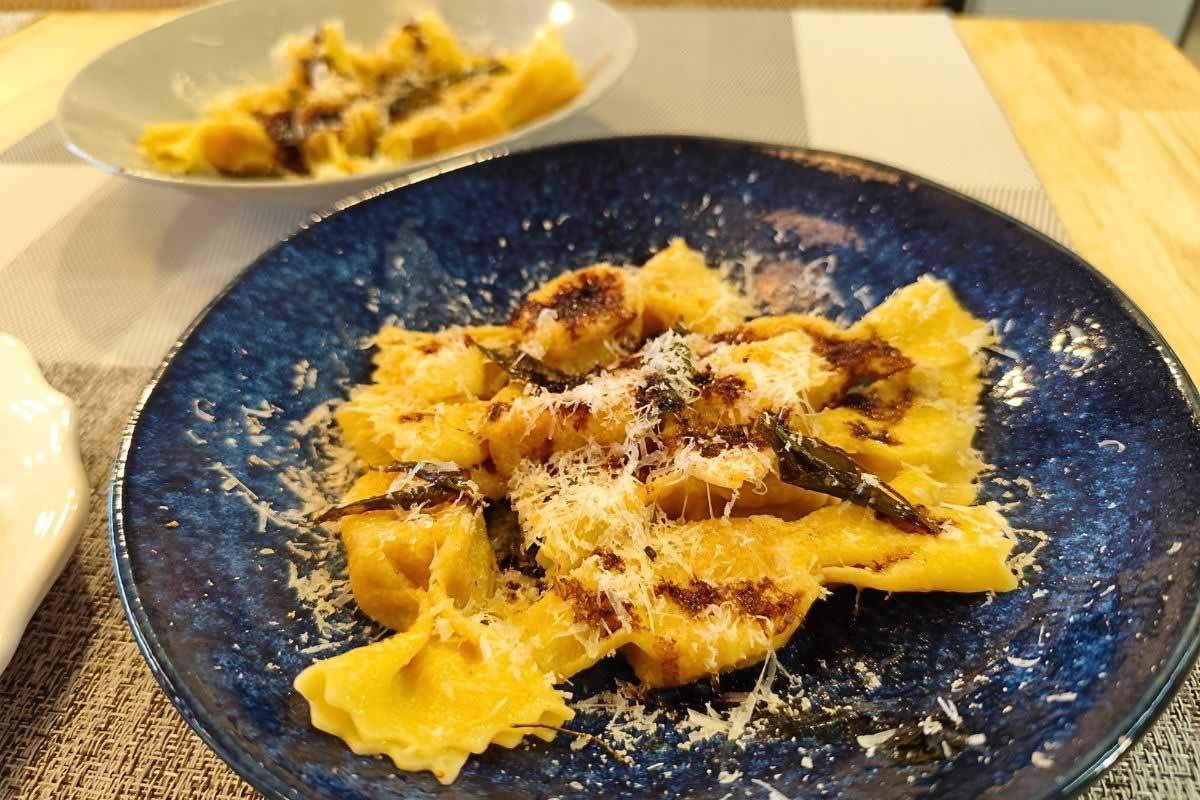 A plated pasta dish with handmade pasta and house-made sauce, the style of pasta served at Reuben's hawker stall in Jurong West